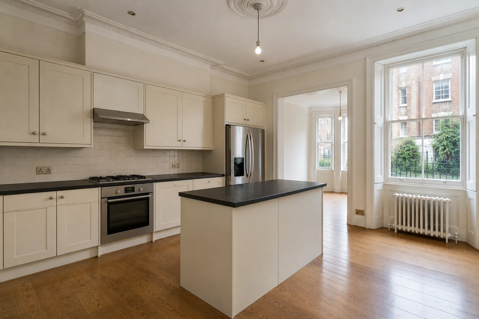 Original cream kitchen with dark laminate worktops